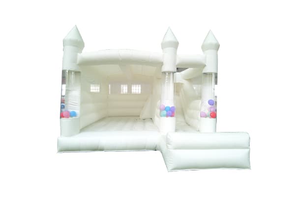 White Castle theme inflatable bounce house with slide and flying balloons