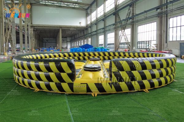 Heavy-duty inflatable wipeout sweeper mat for theme parks